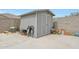 Outdoor shed with double doors and additional outdoor storage space at 30777 W Whitton Ave, Buckeye, AZ 85396