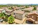 This home has a large backyard with privacy walls, desert landscaping, and a covered patio at 322 N 78Th Pl, Mesa, AZ 85207