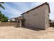 Back of home features a covered patio and fenced-in backyard at 322 N 78Th Pl, Mesa, AZ 85207