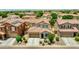 Charming home with a two-car garage, desert landscaping, and a welcoming front porch at 322 N 78Th Pl, Mesa, AZ 85207