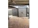 This backyard features storage sheds and open space for outdoor activities at 3229 W Cholla St, Phoenix, AZ 85029