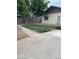 This backyard is ready for turf installation with a mature tree at 3229 W Cholla St, Phoenix, AZ 85029