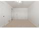 Simple bedroom features neutral carpet and ceiling fan, providing a blank canvas for personal customization at 3719 W Griswold Rd, Phoenix, AZ 85051