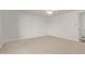 Neutral bedroom with carpet, ceiling fan, and ensuite bathroom at 3719 W Griswold Rd, Phoenix, AZ 85051