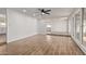 A spacious living room featuring tile floors, and a bright open layout at 3719 W Griswold Rd, Phoenix, AZ 85051