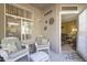 Cozy patio featuring comfortable seating and an open doorway leading into the living space at 3830 E Lakewood Pkwy # 1057, Phoenix, AZ 85048