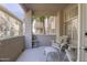 Relaxing patio with comfortable seating and a view of the surrounding buildings and lush greenery at 3830 E Lakewood Pkwy # 1057, Phoenix, AZ 85048
