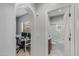 Hallway leading to bathroom with a desk area at 3935 E Rough Rider Rd # 1039, Phoenix, AZ 85050