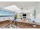 Bright kitchen with stainless steel sink and a view into the living room at 3935 E Rough Rider Rd # 1039, Phoenix, AZ 85050