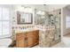 Bathroom featuring granite countertops, tile shower, and a soaking tub at 4353 W Walton Way, Chandler, AZ 85226