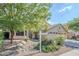 Charming front exterior with mature landscaping and stone accents at 4353 W Walton Way, Chandler, AZ 85226