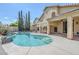 Backyard with a swimming pool, mature trees, and a stucco house at 4353 W Walton Way, Chandler, AZ 85226