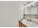 Updated bathroom vanity featuring a white sink and a large mirror at 4599 N 17Th Ave, Phoenix, AZ 85015
