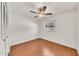 Bedroom with wood-look floors, a window, and a ceiling fan at 4599 N 17Th Ave, Phoenix, AZ 85015