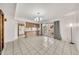 Bright dining area with sliding door and tiled flooring adjacent to kitchen at 4599 N 17Th Ave, Phoenix, AZ 85015