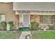 Charming home featuring a brick facade and secure front door with decorative metalwork at 4599 N 17Th Ave, Phoenix, AZ 85015
