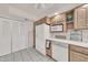 Functional kitchen featuring a refrigerator, dishwasher, and ample cabinet space at 4599 N 17Th Ave, Phoenix, AZ 85015