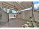 Covered patio features a ceiling fan, a grill, and a storage shed at 4599 N 17Th Ave, Phoenix, AZ 85015