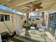 Relaxing outdoor patio featuring comfortable seating, a ceiling fan, and charming decorative accents at 4599 N 17Th Ave, Phoenix, AZ 85015