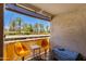 Enjoy the fresh air and scenery from this cozy balcony with seating at 4727 E Lafayette Blvd # 211, Phoenix, AZ 85018