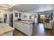 Cozy open-concept living space with a modern kitchen, work space and view of the outdoor balcony at 4727 E Lafayette Blvd # 211, Phoenix, AZ 85018