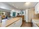 Open-concept living space featuring butcher block counters and stylish decor at 4727 E Lafayette Blvd # 211, Phoenix, AZ 85018