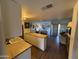 Bright living area featuring an open floor plan and an inviting kitchen island at 4727 E Lafayette Blvd # 211, Phoenix, AZ 85018