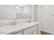 Bright bathroom with a double sink vanity and marble countertop at 48402 N Duran Way, Gold Canyon, AZ 85118