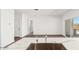Modern kitchen with a marble countertop island and stainless steel sink at 48402 N Duran Way, Gold Canyon, AZ 85118