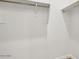 An organized and bright walk-in closet space at 48402 N Duran Way, Gold Canyon, AZ 85118