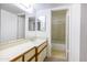 Bathroom featuring a sink, toilet, tub and shower combo with sliding glass doors at 5035 N 17Th Ave # 205, Phoenix, AZ 85015