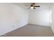 Neutral bedroom featuring a ceiling fan and light-colored carpet at 5035 N 17Th Ave # 205, Phoenix, AZ 85015