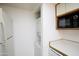 Efficient laundry area with stacked washer/dryer and built-in microwave in kitchen at 5035 N 17Th Ave # 205, Phoenix, AZ 85015