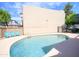 Community pool featuring blue water and lounge chairs, ideal for relaxation at 5035 N 17Th Ave # 205, Phoenix, AZ 85015