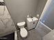Bathroom features marble-look shower, modern vanity and fixtures at 5042 S 22Nd St, Phoenix, AZ 85040