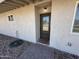 Home exterior features a front door with glass window, brick pathway, and xeriscape yard at 5042 S 22Nd St, Phoenix, AZ 85040