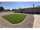 Charming home featuring a low maintenance desert landscape and artificial grass at 5042 S 22Nd St, Phoenix, AZ 85040