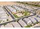 Neighborhood aerial view, showcasing the well-maintained homes, green spaces, and community park at 512 E Bamboo Ln, San Tan Valley, AZ 85140