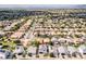 Community aerial view, showcasing organized streetscapes, modern houses, and well-maintained lawns at 512 E Bamboo Ln, San Tan Valley, AZ 85140