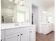 Bright bathroom with dual vanities, ample counter space, and a separate shower area at 512 E Bamboo Ln, San Tan Valley, AZ 85140