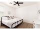 Comfortable bedroom featuring a ceiling fan, neutral colors, and cozy decor for a relaxing ambiance at 512 E Bamboo Ln, San Tan Valley, AZ 85140