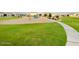 Enjoy the community park offering a playground and green space, perfect for outdoor activities at 512 E Bamboo Ln, San Tan Valley, AZ 85140