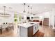 Open kitchen with a large island that integrates the dining and living areas at 512 E Bamboo Ln, San Tan Valley, AZ 85140