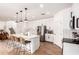 Spacious kitchen featuring a center island, stainless steel appliances, and ample storage at 512 E Bamboo Ln, San Tan Valley, AZ 85140