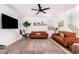 Inviting living room with comfortable seating, stylish decor, and natural light at 512 E Bamboo Ln, San Tan Valley, AZ 85140