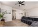 Upstairs loft area with plush gray sofa and contemporary decor at 512 E Bamboo Ln, San Tan Valley, AZ 85140