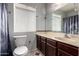 Cozy bathroom with vanity, toilet, mirror, and shower/tub combo at 5135 E Evergreen St # 1166, Mesa, AZ 85205