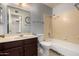 Bathroom features a vanity, toilet, and tub with shower; neutral color scheme at 5135 E Evergreen St # 1166, Mesa, AZ 85205