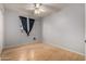 Bedroom featuring hardwood floors, light blue walls, and a window at 5135 E Evergreen St # 1166, Mesa, AZ 85205