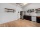 Open kitchen layout with stainless steel refrigerator, wooden floors and plenty of light at 5135 E Evergreen St # 1166, Mesa, AZ 85205